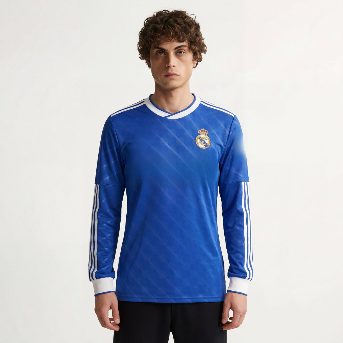 Royal blue Real Madrid 25/26 long sleeve third jersey front view