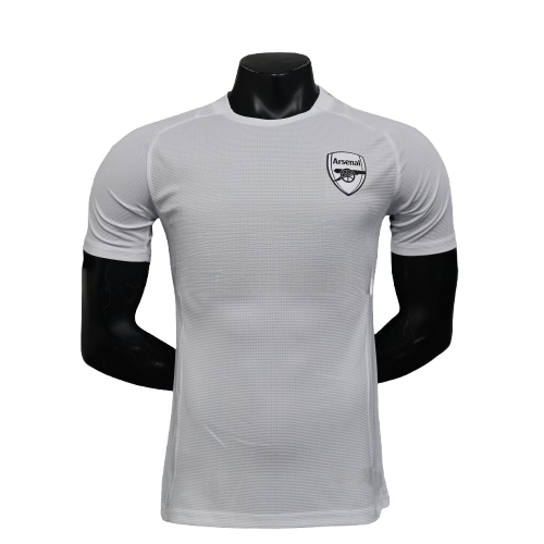 White Arsenal 25/26 player training jersey with black adidas logo